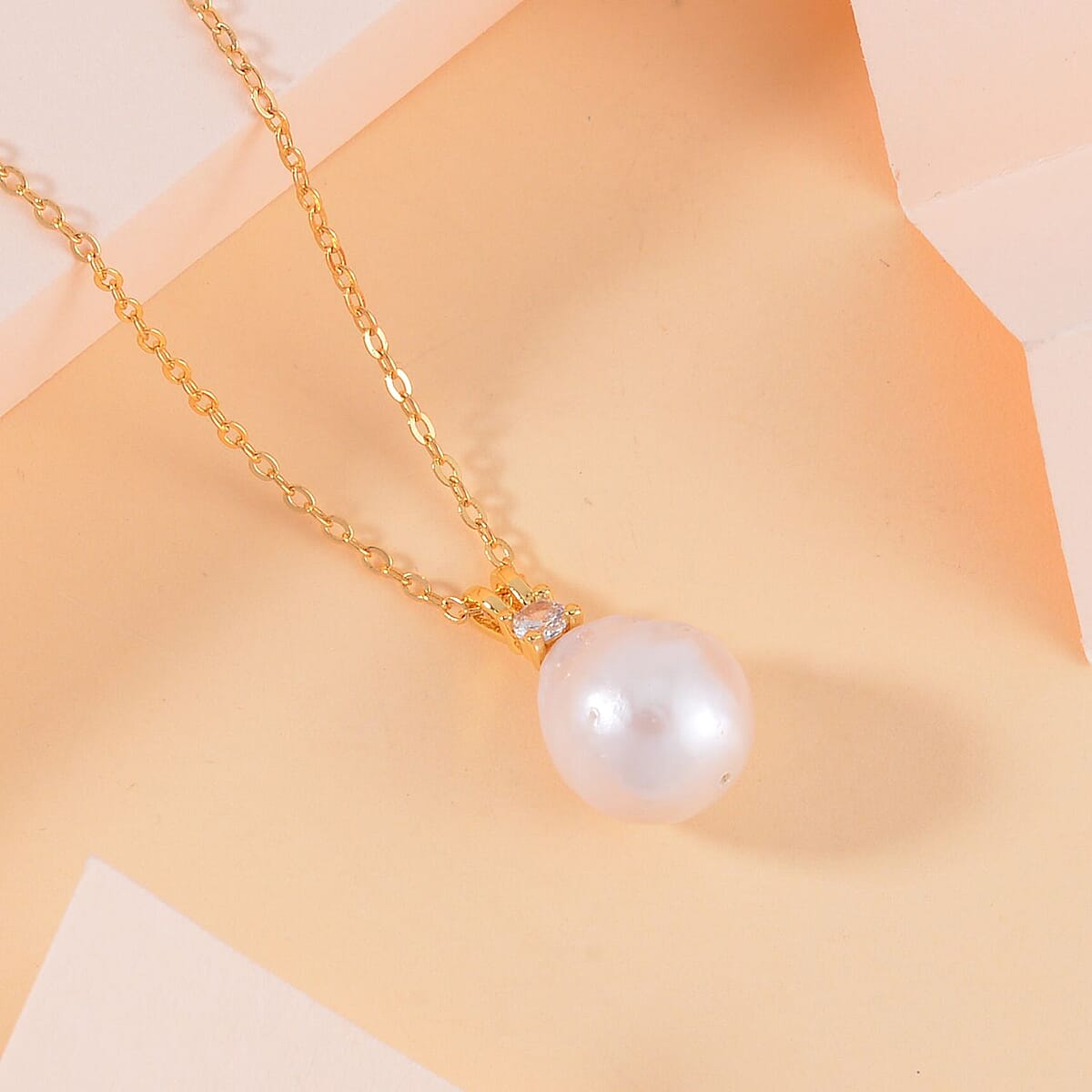 Organic Shape White Baroque Pearl and Simulated Diamond Pendant Necklace 20 Inches in Goldtone 0.10 ctw image number 1