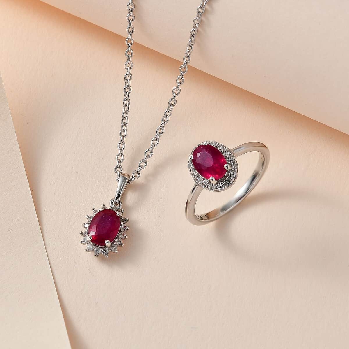 Premium Niassa Ruby (FF) and White Zircon Halo Ring Size 5.0 and Pendant Necklace 20 Inches in Platinum Over Sterling Silver 2.90 ctw image number 1