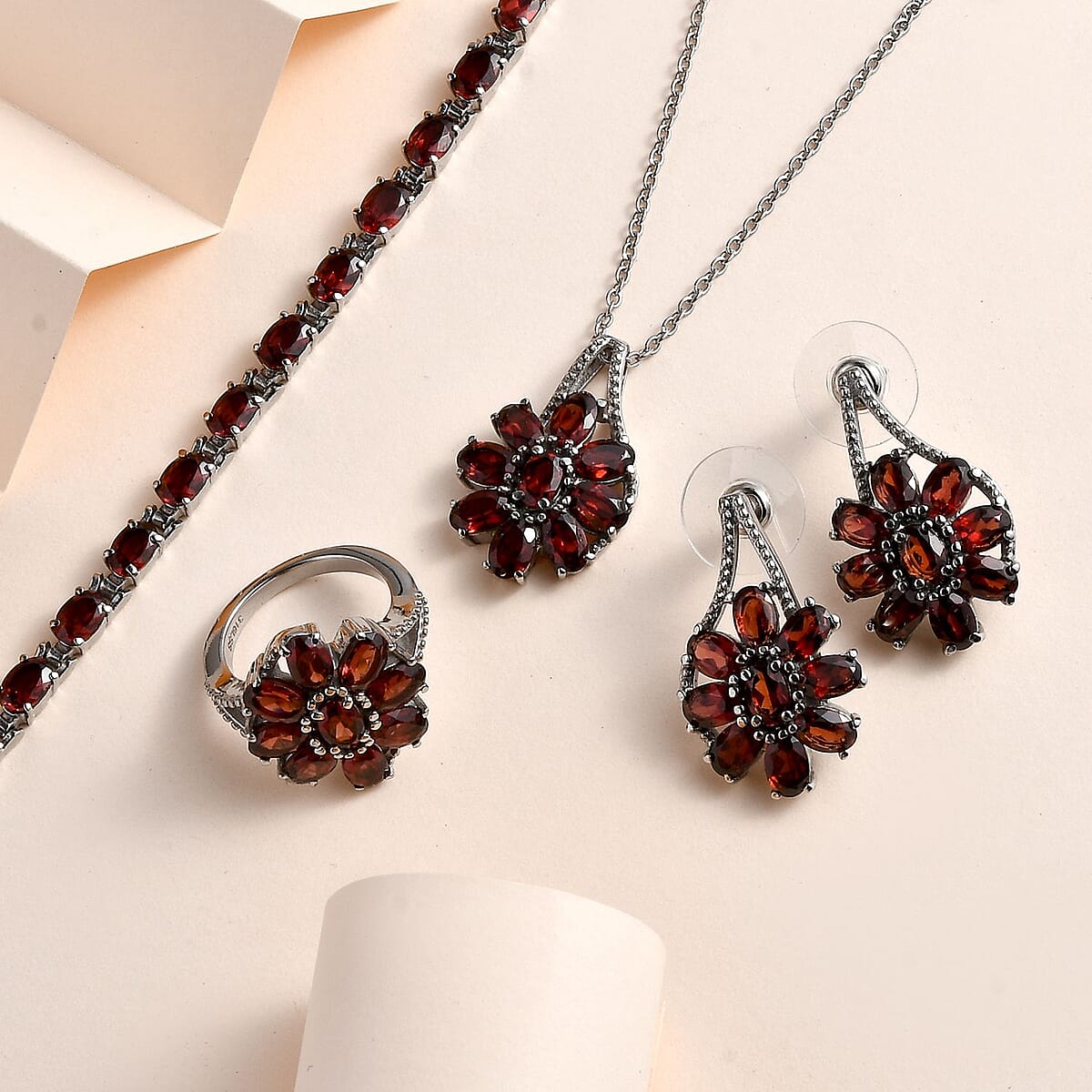 Mozambique Garnet Bracelet (6.5-8.5In), Earrings, Ring (Size 9) and Pendant Necklace (20 Inches) in Stainless Steel 29.50 ctw image number 1