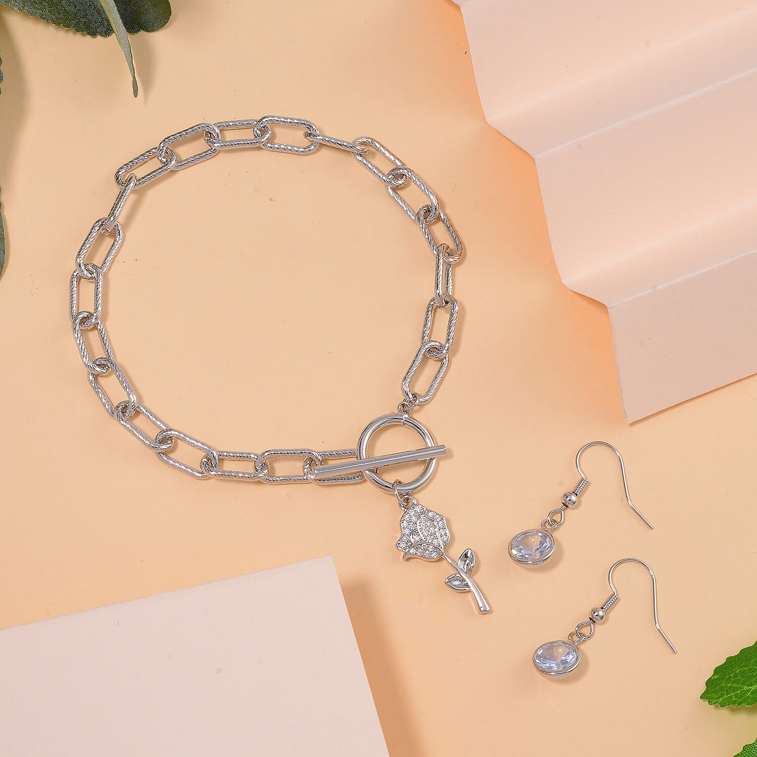 Simulated Diamond and Austrian Crystal Rose Charm Bracelet (7.50In) and Earrings in Silvertone