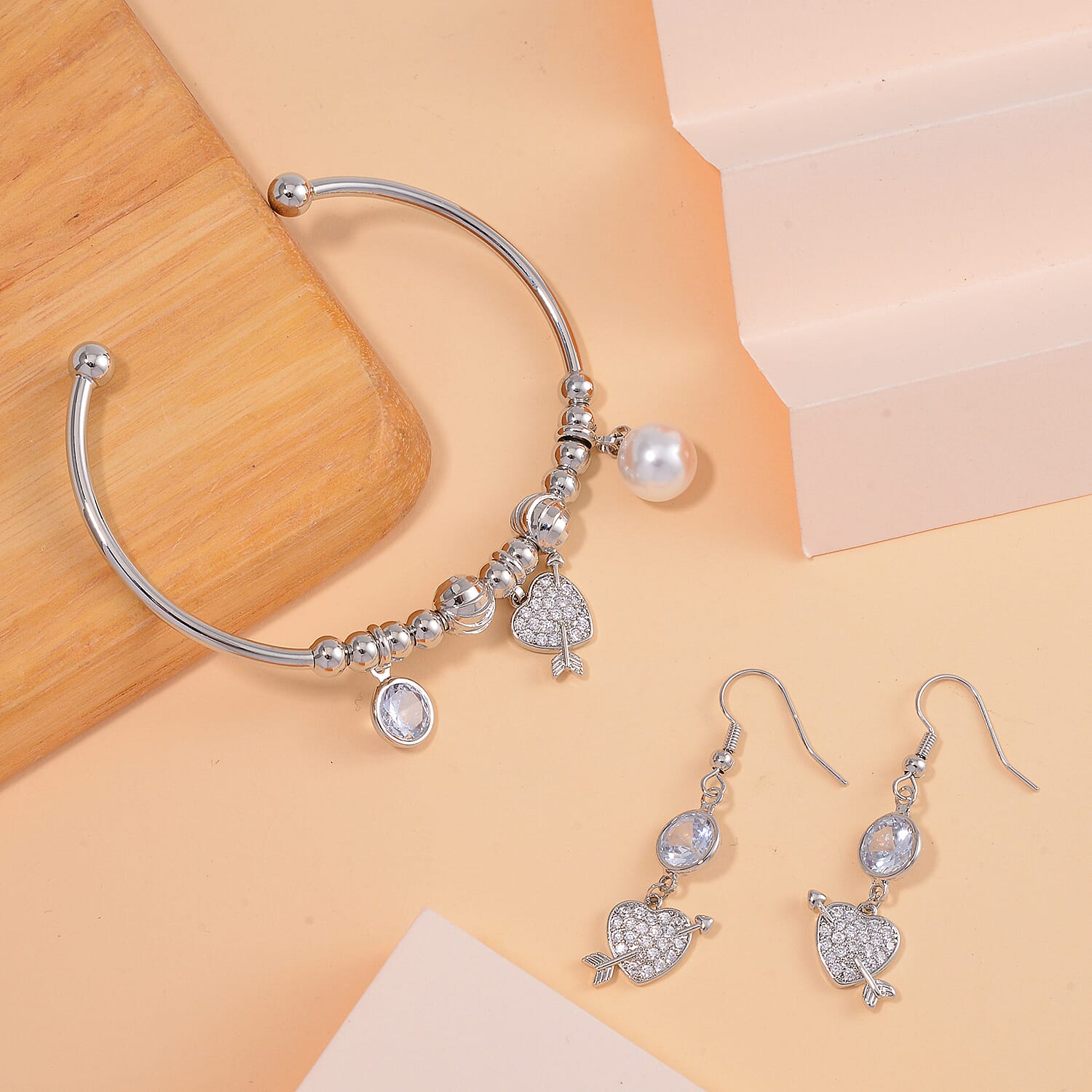 Simulated Pearl, Simulated Diamond, Austrian Crystal Bangle Bracelet (7.00In) and Earrings with Heart Charm in Silvertone 1.10 ctw