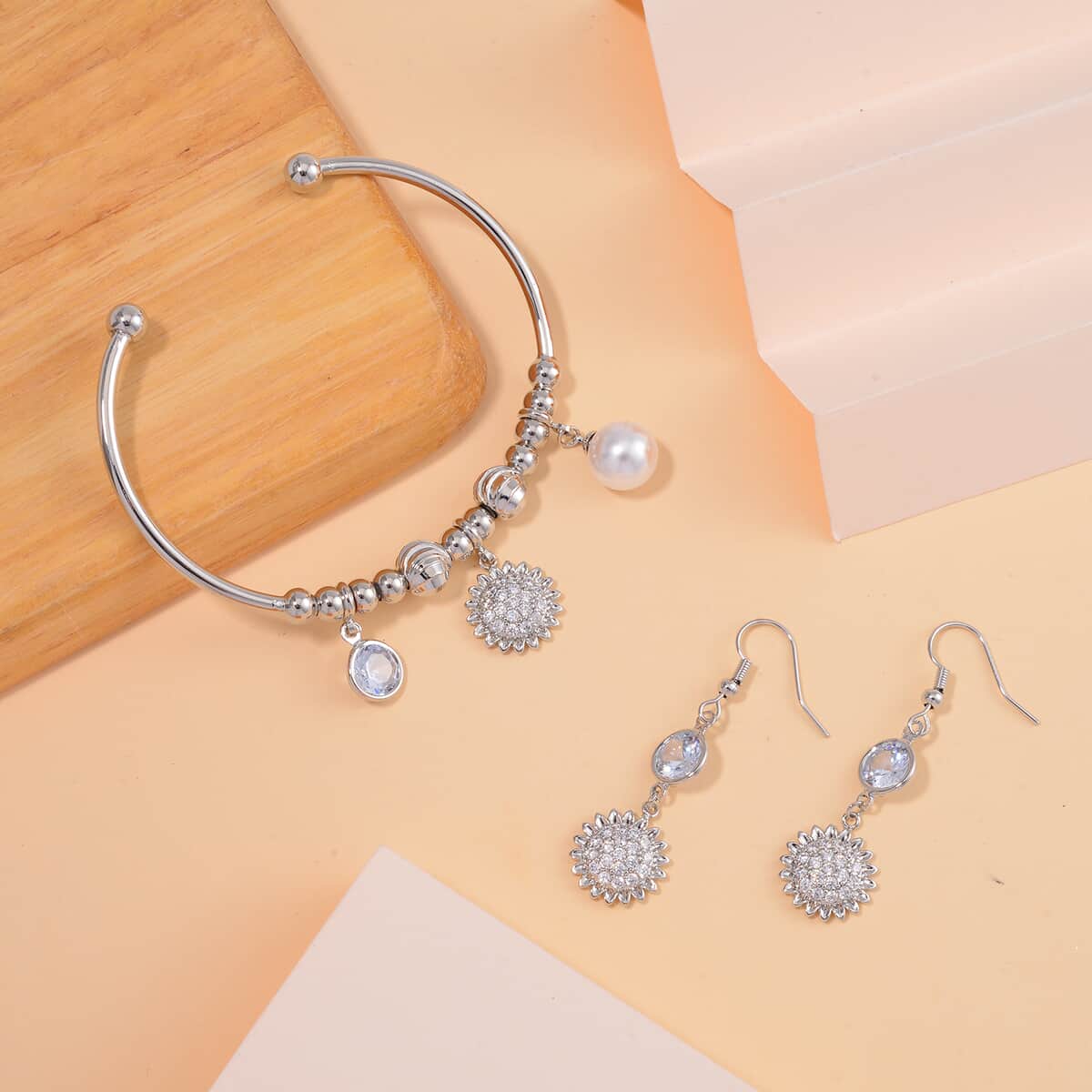 Simulated Pearl, Simulated Diamond, Austrian Crystal Earrings and Bangle Bracelet (7.00 In) with Sunflower Charm in Silvertone 2.60 ctw image number 1