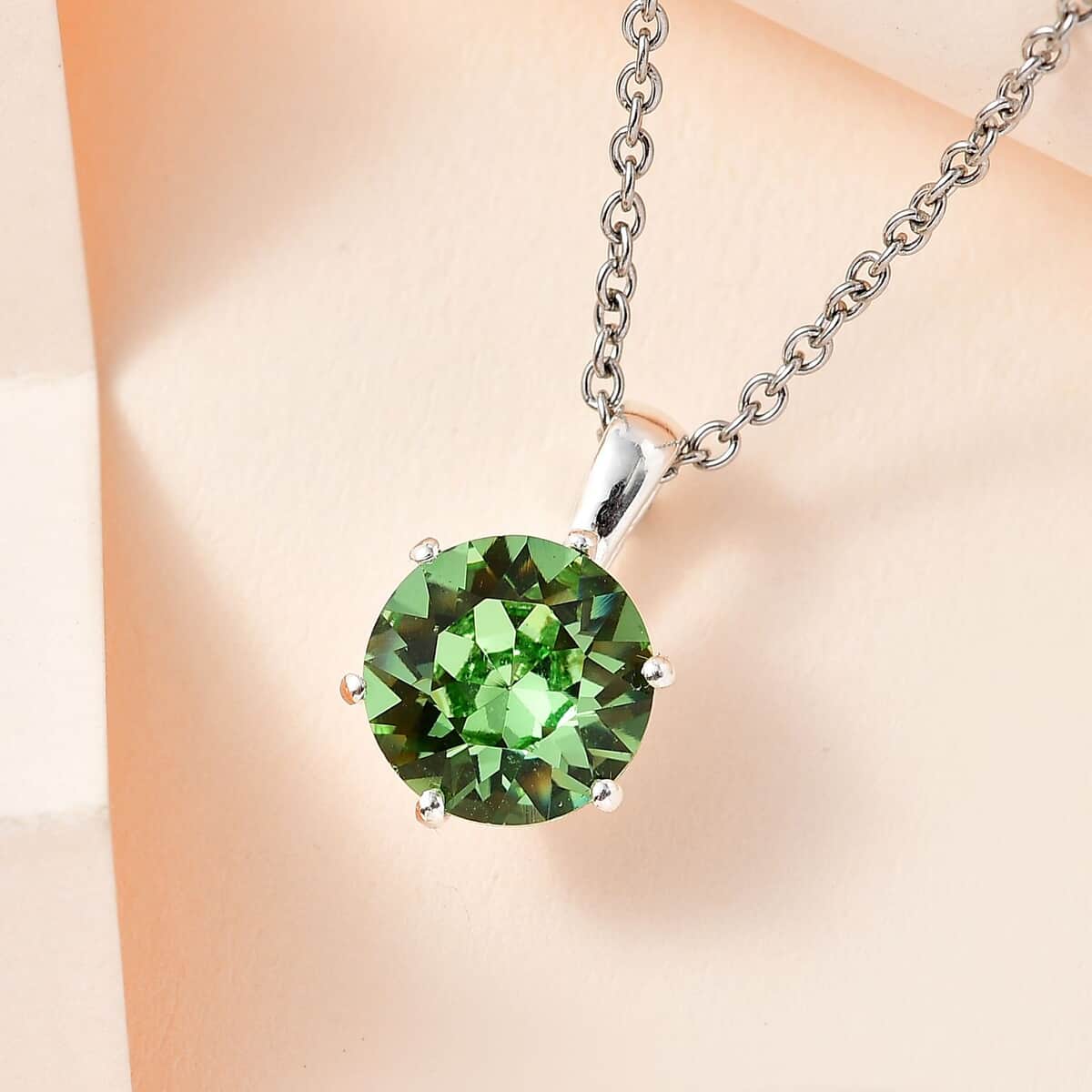 Peridot Color Crystal Solitaire Pendant in Sterling Silver with Stainless Steel Necklace (20 Inches) image number 1