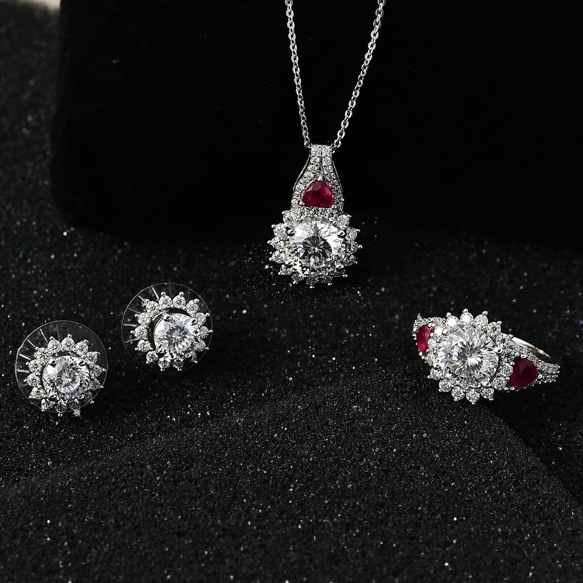 TLV 120 Facet Moissanite (Rnd 8mm), Niassa Ruby (FF) Stud Earrings, Ring (Size 6.0) and Pendant Necklace (20 Inches) in Platinum Over Sterling Silver 8.20 ctw image number 1