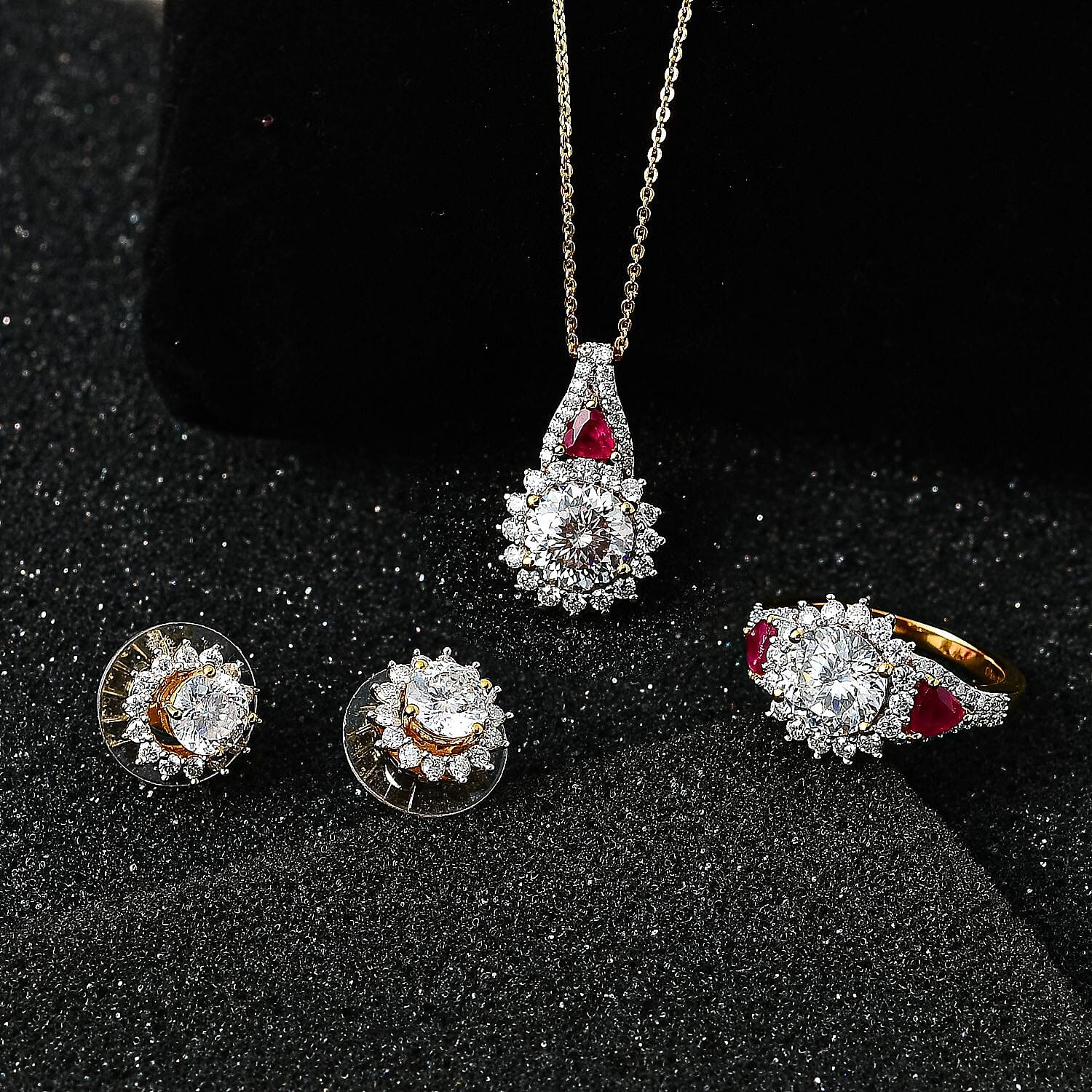 120 Facet Moissanite (Rnd 8mm), Niassa Ruby (FF) Stud Earrings, Ring (Size 6.0) and Pendant Necklace (20 Inches) in Vermeil YG Over Sterling Silver 8.20 ctw