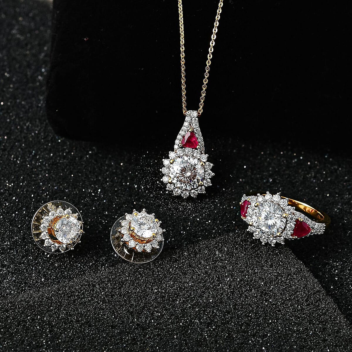 120 Facet Moissanite and Niassa Ruby (FF) Stud Earrings, Ring (Size 8.0) and Pendant Necklace 20 Inches in Vermeil Yellow Gold Over Sterling Silver 8.20 ctw image number 1