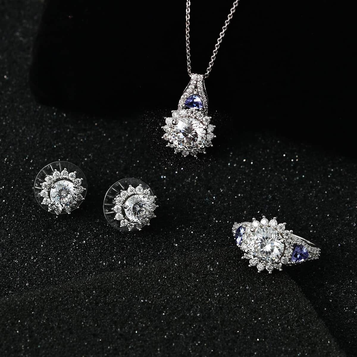 120 Facet Moissanite and Tanzanite Stud Earrings, Ring (Size 9.0) and Pendant Necklace 20 Inches in Platinum Over Sterling Silver 7.90 ctw image number 1