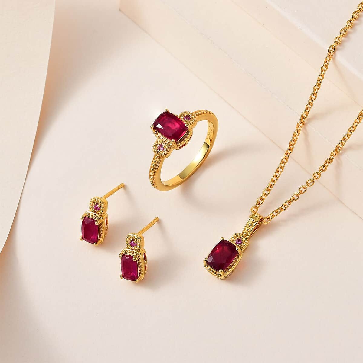 Niassa Ruby (FF) and Pink Sapphire Stud Earrings, Ring (Size 8.0), Pendant in Vermeil Yellow Gold Over Sterling Silver with ION Plated YG Stainless Steel Necklace 20 Inches 4.30 ctw image number 1