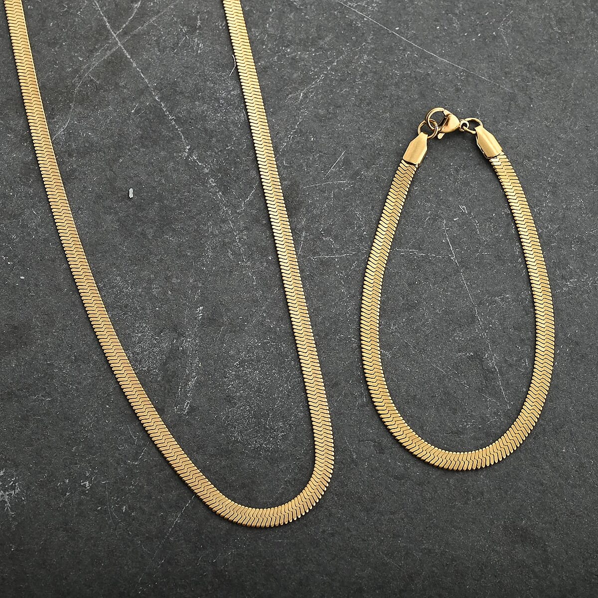 Herringbone Chain Bracelet (7.50In) and Necklace 20 Inches in ION Plated YG Stainless Steel image number 1