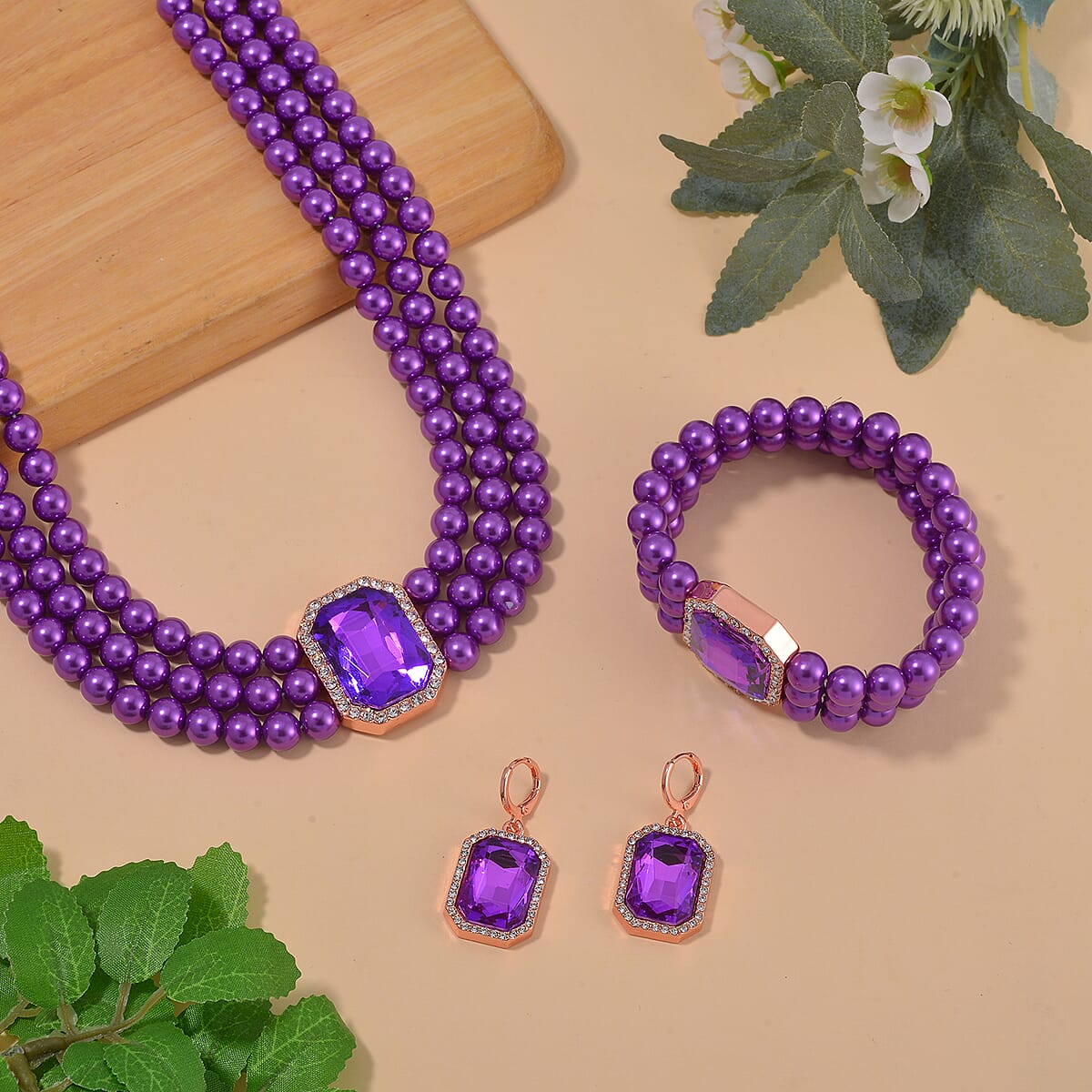 Simulated Purple Amethyst, Austrian Crystal and Simulated Purple Pearl 3 Row Necklace 16-20 Inches Stretch Bracelet and Earrings in Rosetone image number 1