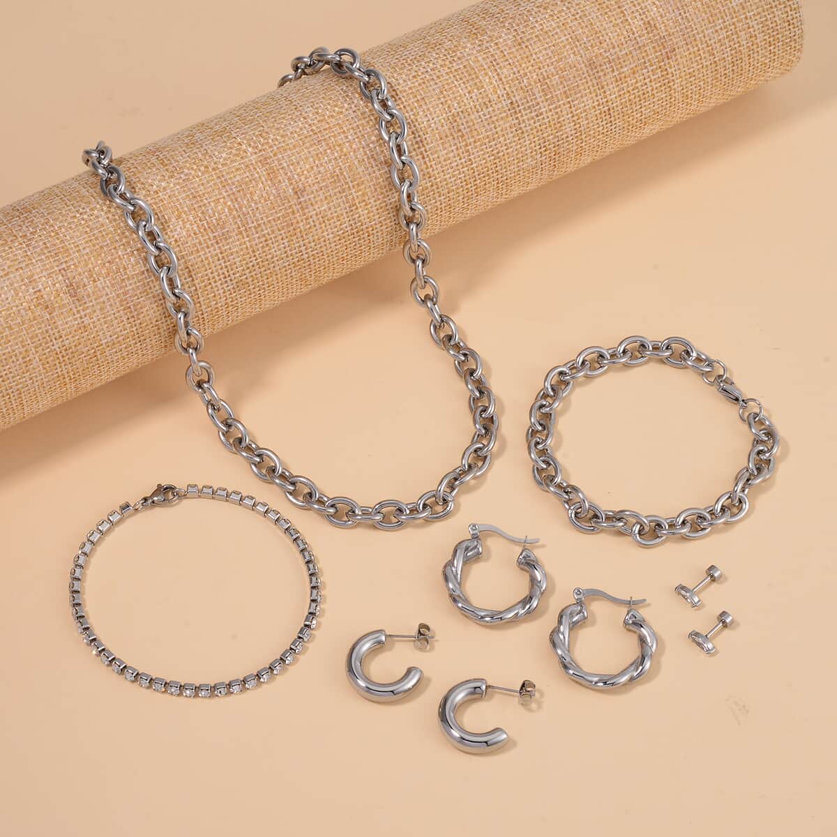 6pcs Set - Simulated Diamond 3pcs Hoop, Twisted and Marquise Earrings and 2pc Bracelet (7 & 7.50In) and Necklace (20 Inches) in Stainless Steel image number 1