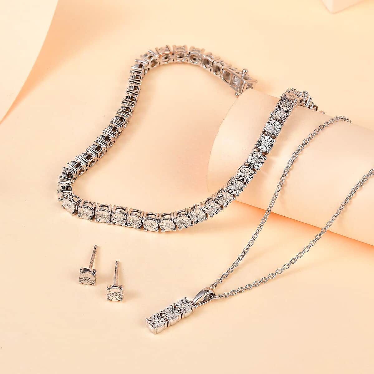 White Diamond Pendant, Earrings and Bracelet in Platinum Over Sterling Silver 0.22 ctw image number 1