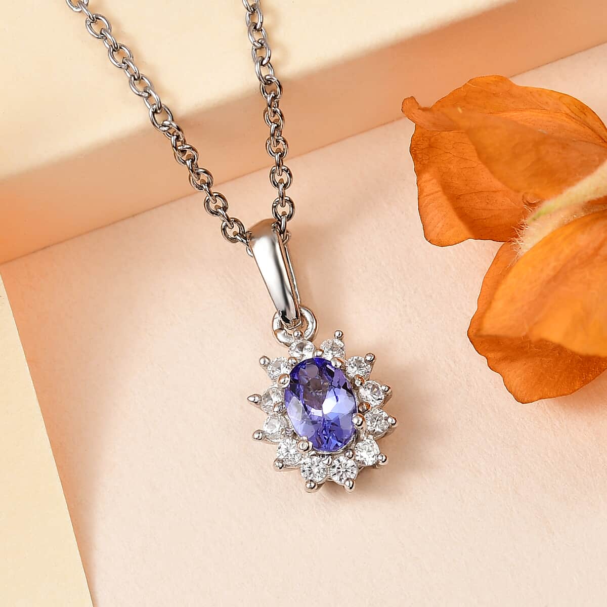 Tanzanite and White Zircon Sunburst Pendant in Platinum Over Sterling Silver with Stainless Steel Necklace 20 Inches 0.85 ctw image number 1
