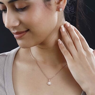 Moissanite 0.75 ctw Earrings and Pendant without Chain in Vermeil Rose Gold Over Sterling Silver