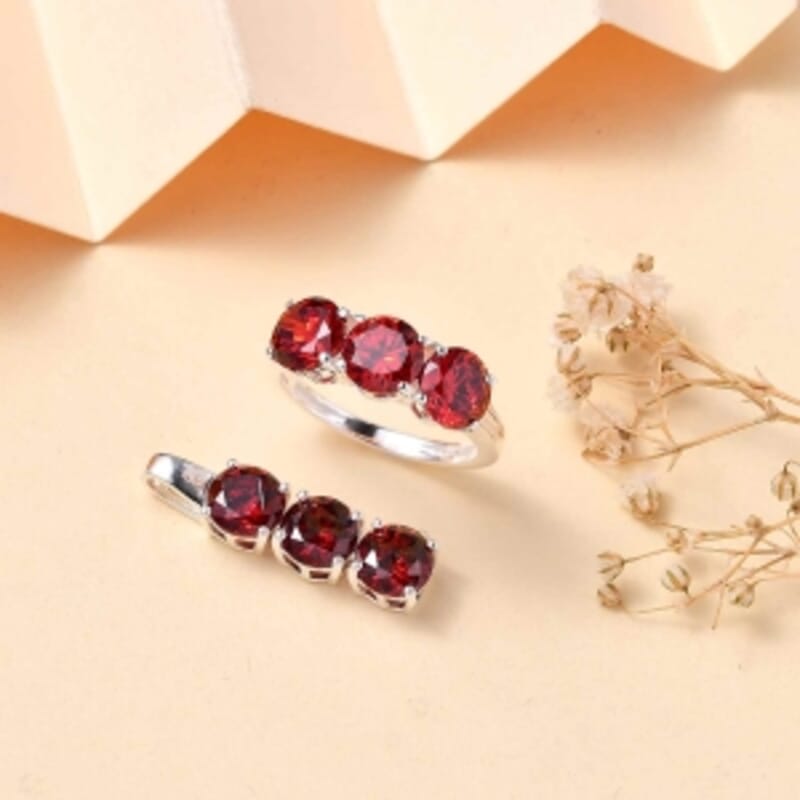 Simulated Red Diamond 3 Stone 6.00 ctw Ring (Size 11.5) and Pendant in Sterling Silver