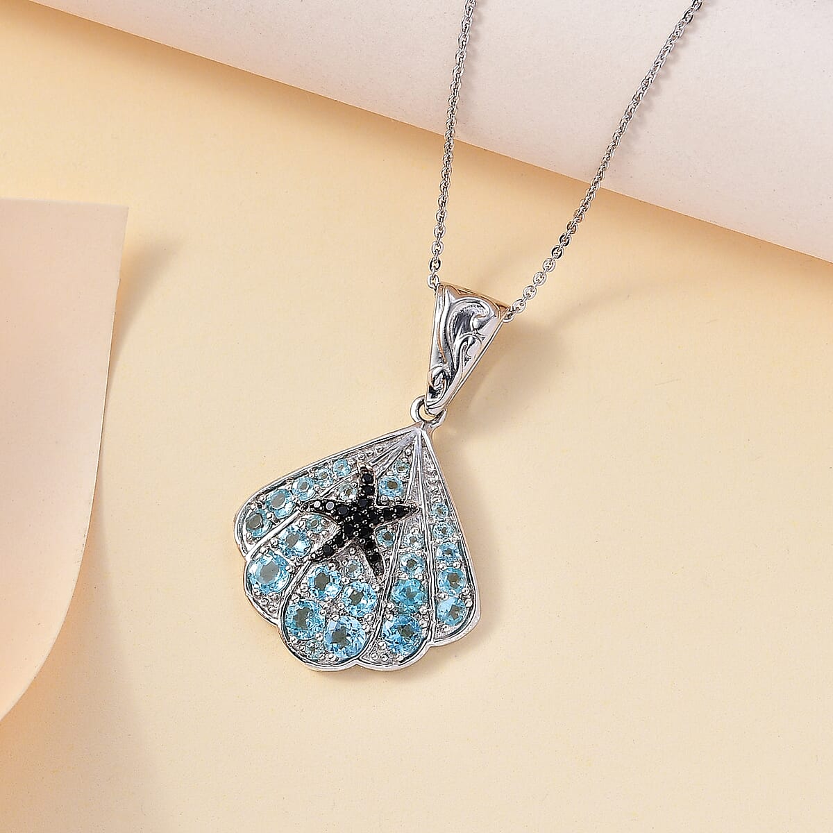 Betroka Blue Apatite and Thai Black Spinel Star Fish and Shell Pendant Necklace 20 Inches in Rhodium Over Sterling Silver 2.10 ctw image number 1