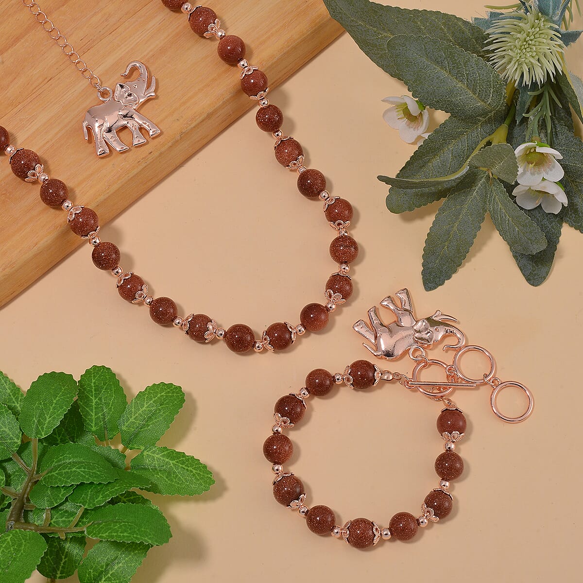 Golden Sunstone 320.00 ctw Beaded Bracelet (6.50-8.00In) and Necklace 18 Inches with Elephant Charm in Rosetone image number 1