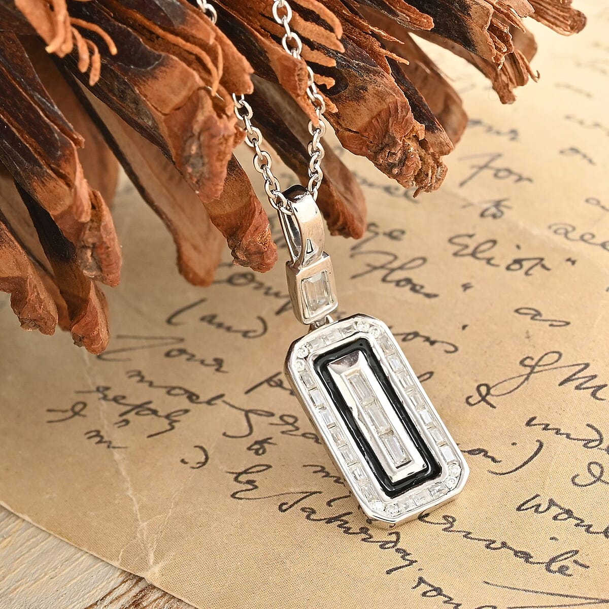 Clarte Black Tie Collection Moissanite and Black Enameled Pendant Necklace 18 Inches in Platinum Over Sterling Silver 0.20 ctw image number 1