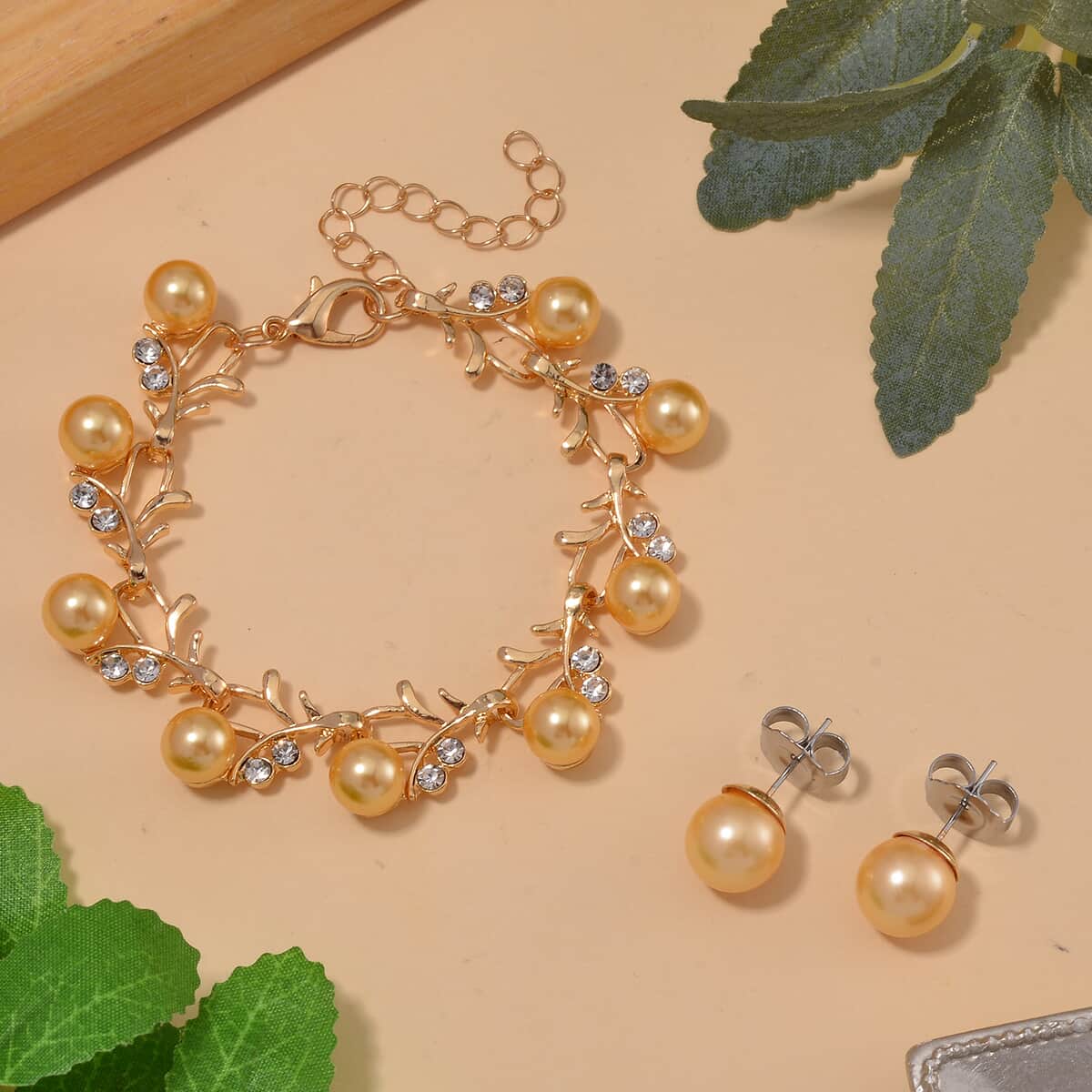 Golden Shell Pearl and White Crystal Bracelet (6.50-8.00In) and Stud Earrings in ION Plated YG Stainless Steel image number 1