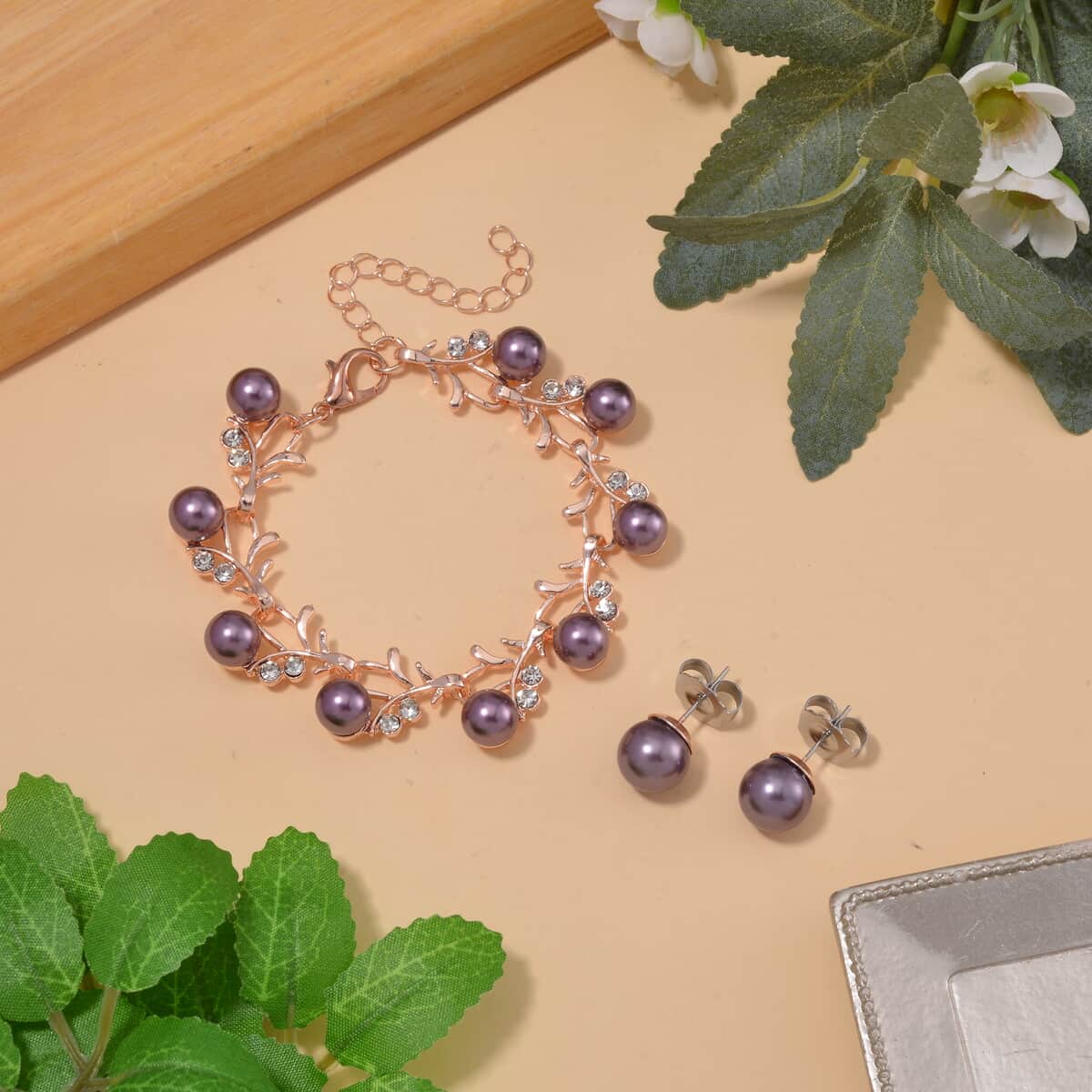 Purple Shell Pearl and White Crystal Bracelet (6.50-8.00In) and Stud Earrings in ION Plated RG and Stainless Steel image number 1