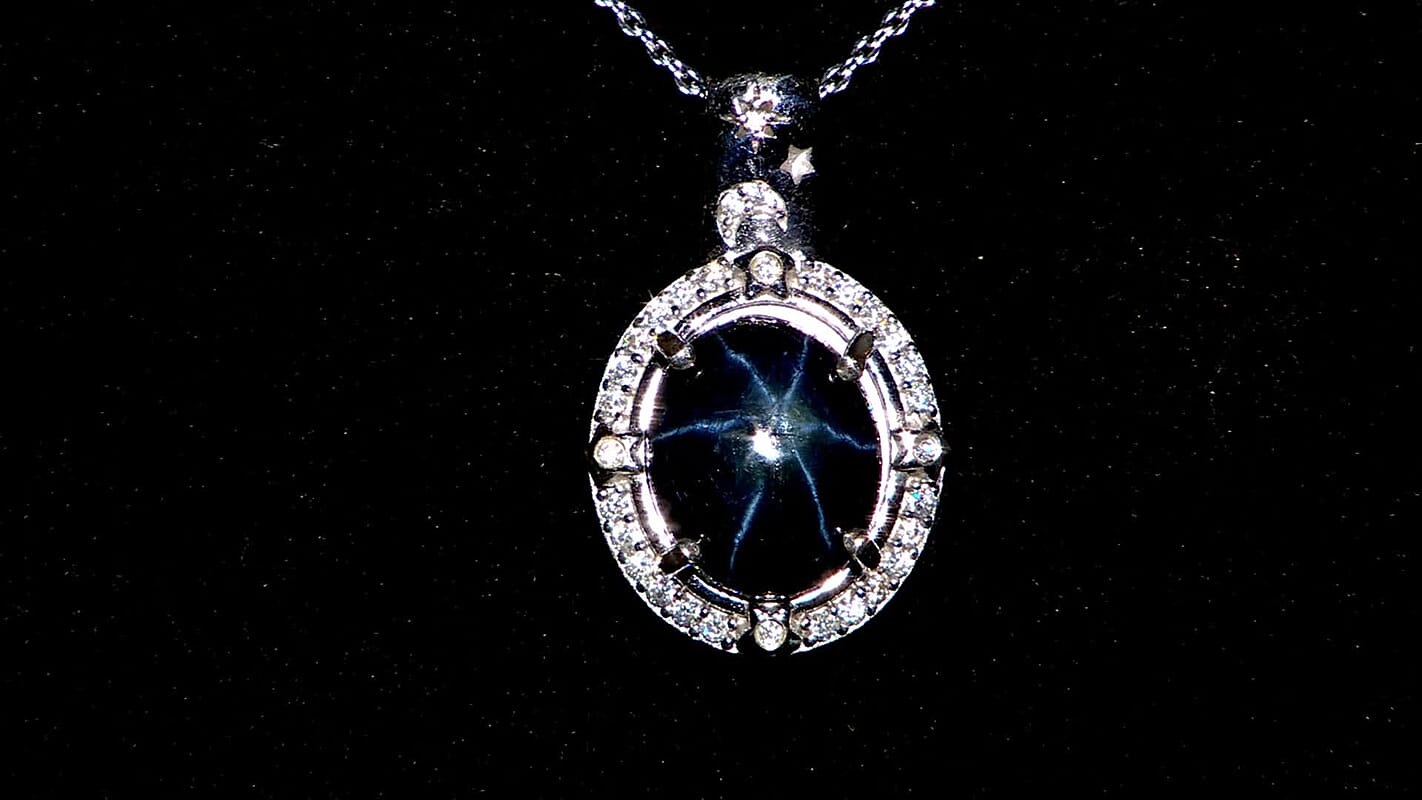 Blue Star Sapphire (DF) and Moissanite 6.90 ctw Celestial Pendant Necklace in Rhodium Over Sterling Silver 20 Inches