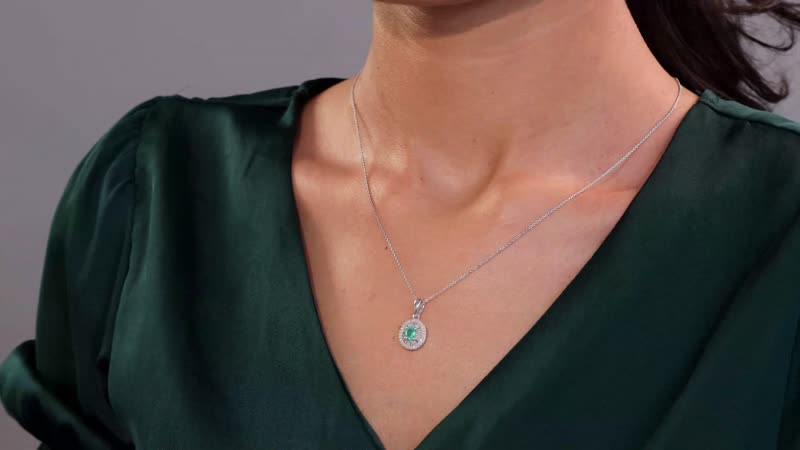 Boyaca Colombian Emerald and Diamond 0.65 ctw Verdant Halo Pendant Necklace in Rhodium Over Sterling Silver 20 Inches