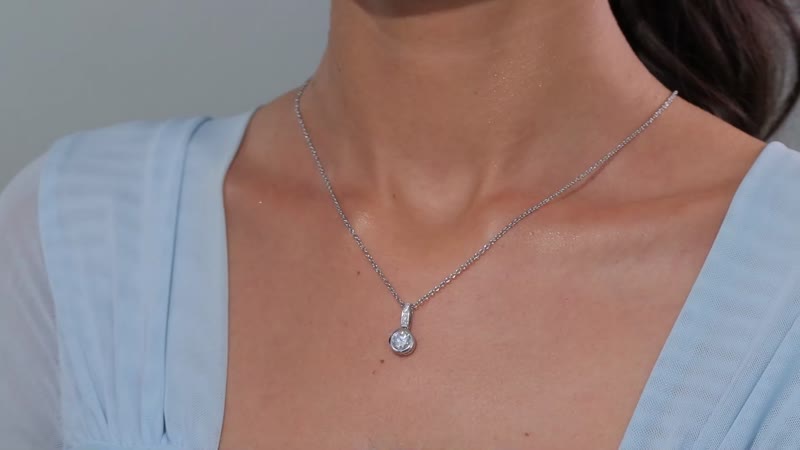 Moissanite 1.30 ctw Pendant in Rhodium Over Sterling Silver with Stainless Steel Necklace 20 Inches