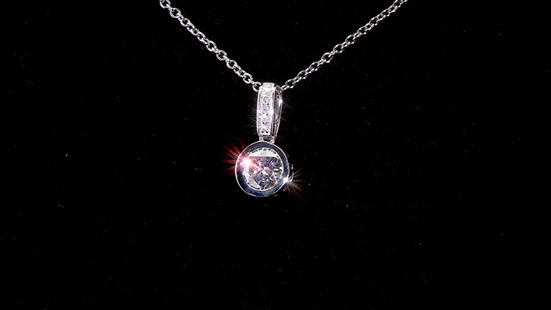 Moissanite 1.30 ctw Pendant in Rhodium Over Sterling Silver with Stainless Steel Necklace 20 Inches