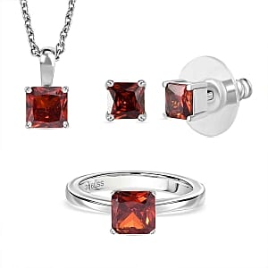 Simulated Red Diamond Ring (Size 11.5), 3.40 ctw Earrings and Pendant Necklace (20 Inches) in Stainless Steel