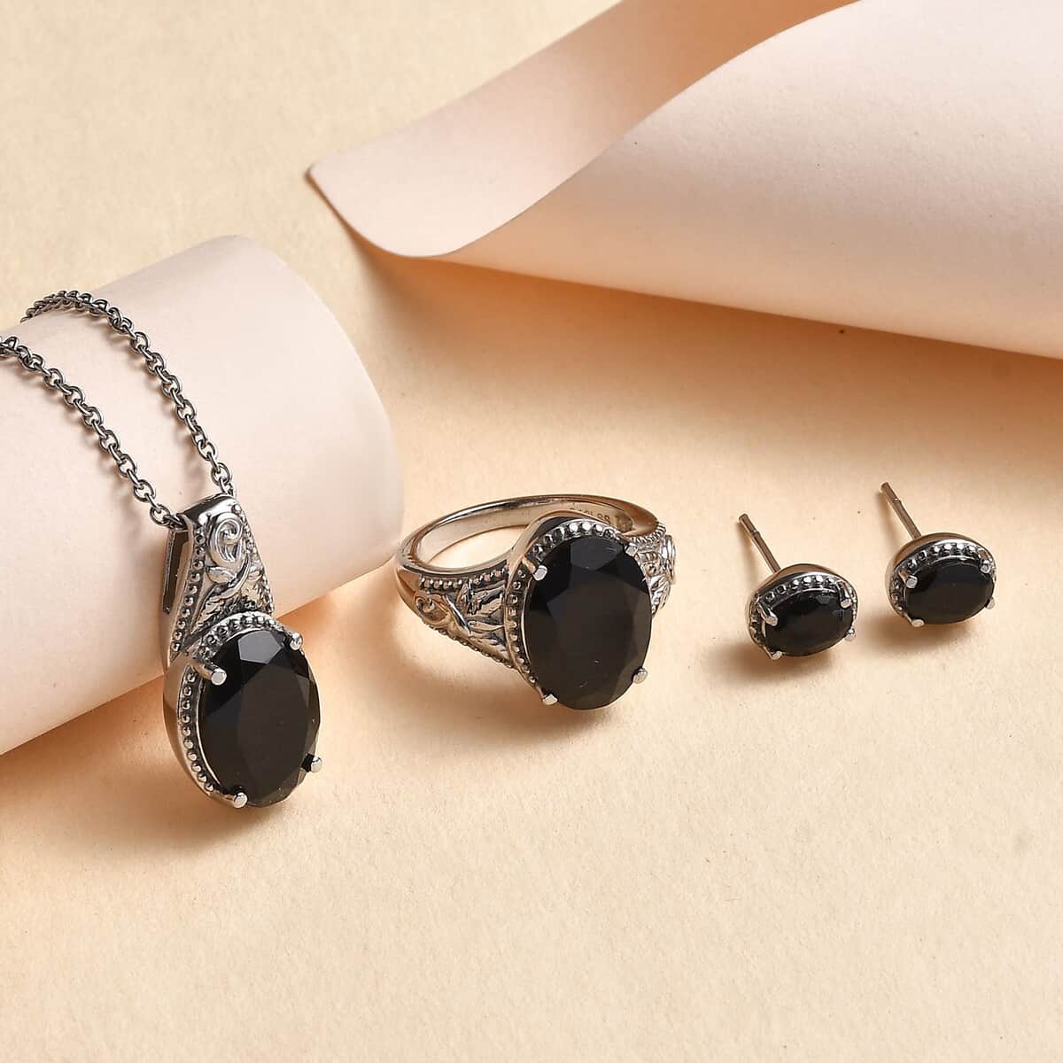 Doorbuster 3piece Set - Thai Black Spinel 11.70 ctw Stud Earrings, Solitaire Ring (Size 5.0) and Pendant Necklace 20 Inches in Stainless Steel image number 1