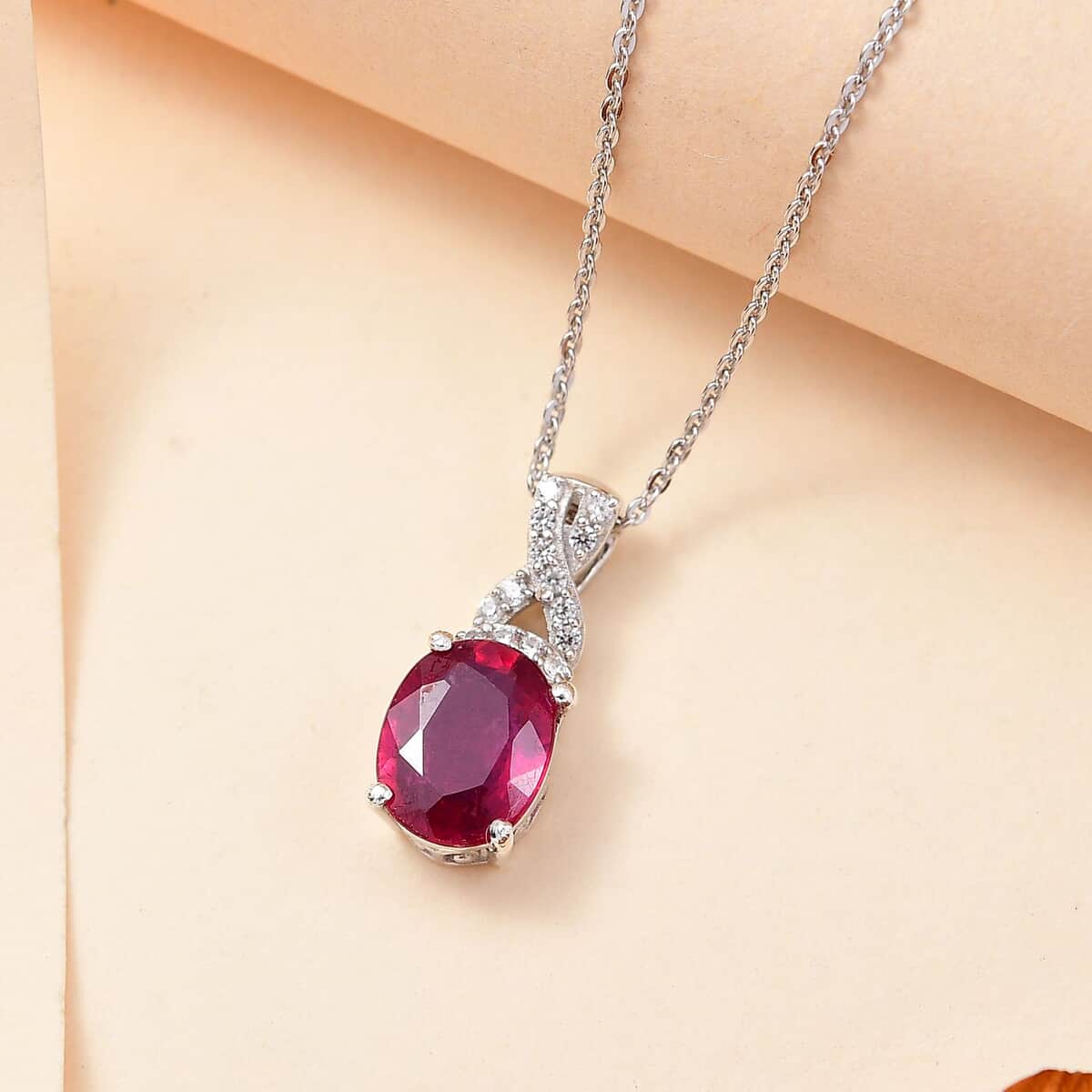 Premium Niassa Ruby (FF) and White Zircon 2.75 ctw Infinity Pendant Necklace in Rhodium Over Sterling Silver 20 Inches image number 1