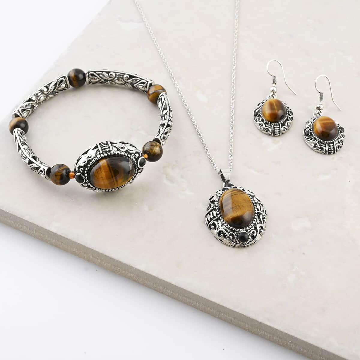 Tiger Eye and Black Obsidian 70.80 ctw Strechable Bracelet, Earrings, Pendant Necklace in Silvertone 18 Inches image number 1