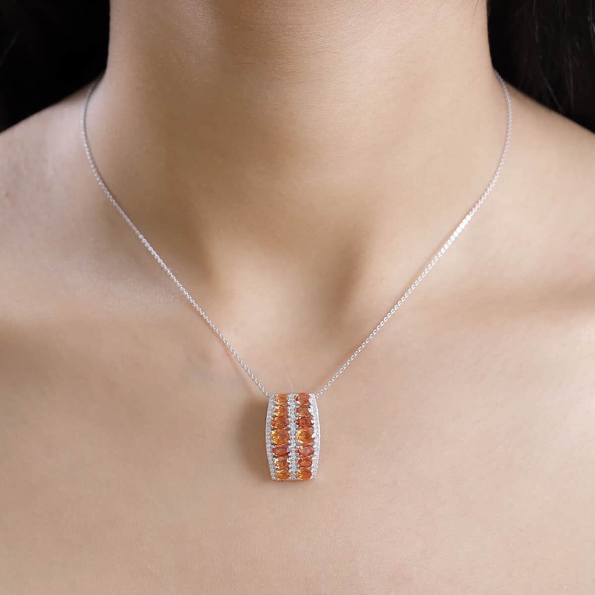 Orange Sapphire and White Zircon 4.80 ctw Pendant Necklace in Rhodium Over Sterling Silver 20 Inches image number 2