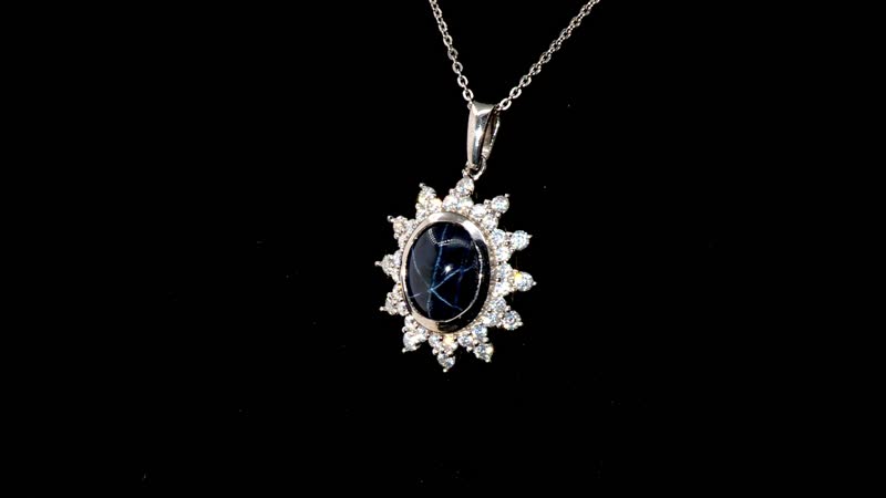Blue Star Sapphire (DF) and Moissanite 6.75 ctw Starburst Pendant Necklace in Rhodium Over Sterling Silver 20 Inches