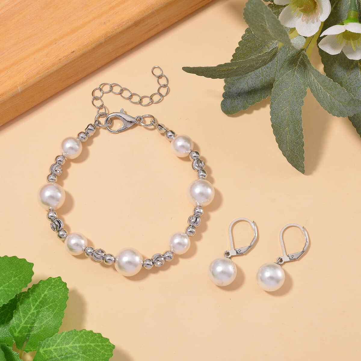 White Shell Pearl Bracelet (6.50-8.50In) and Lever Back Earrings in Silvertone and Stainless Steel image number 1