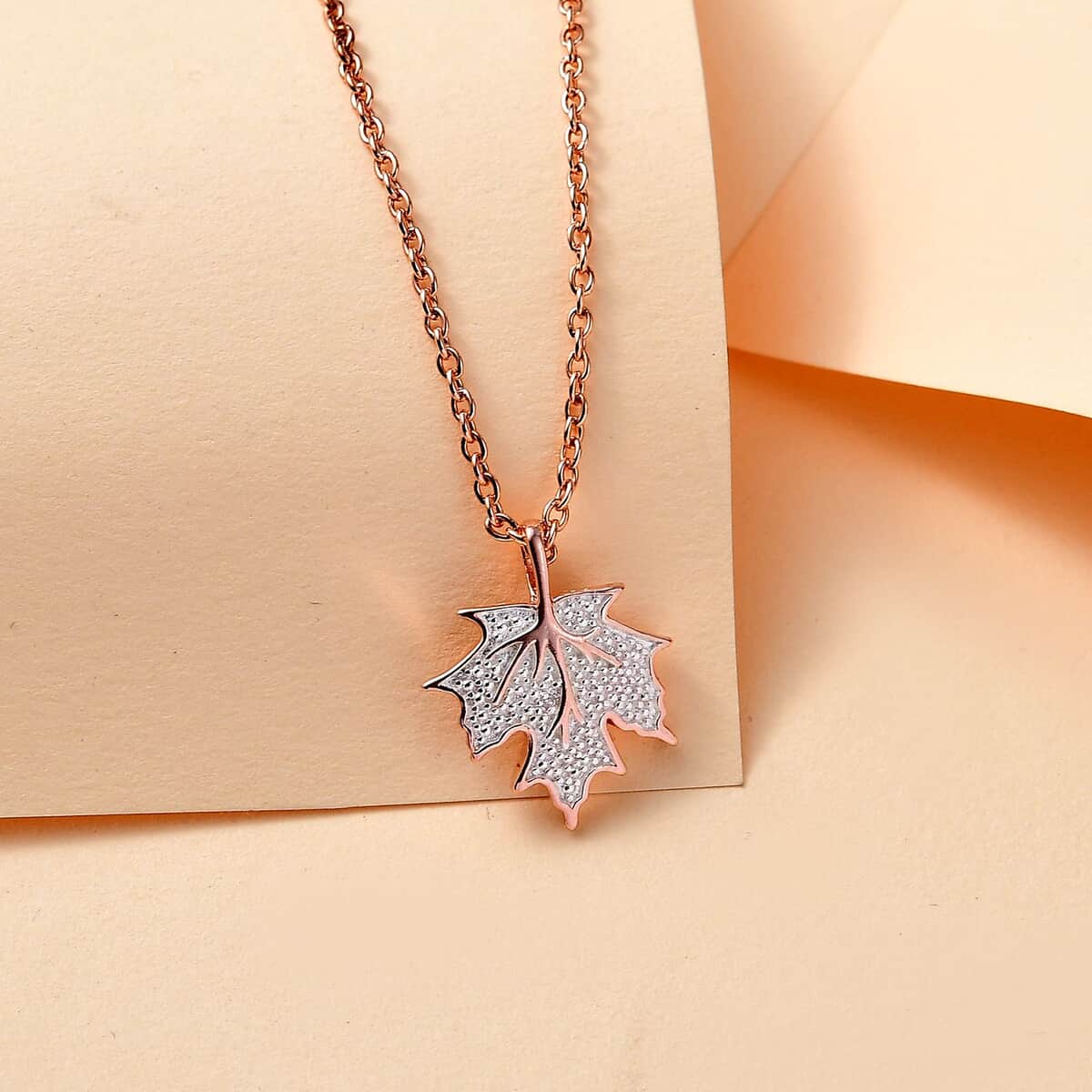 Karis White Diamond Accent Leaf Pendant in 18K RG Plated with ION Plated RG Stainless Steel Necklace 20 Inches image number 1