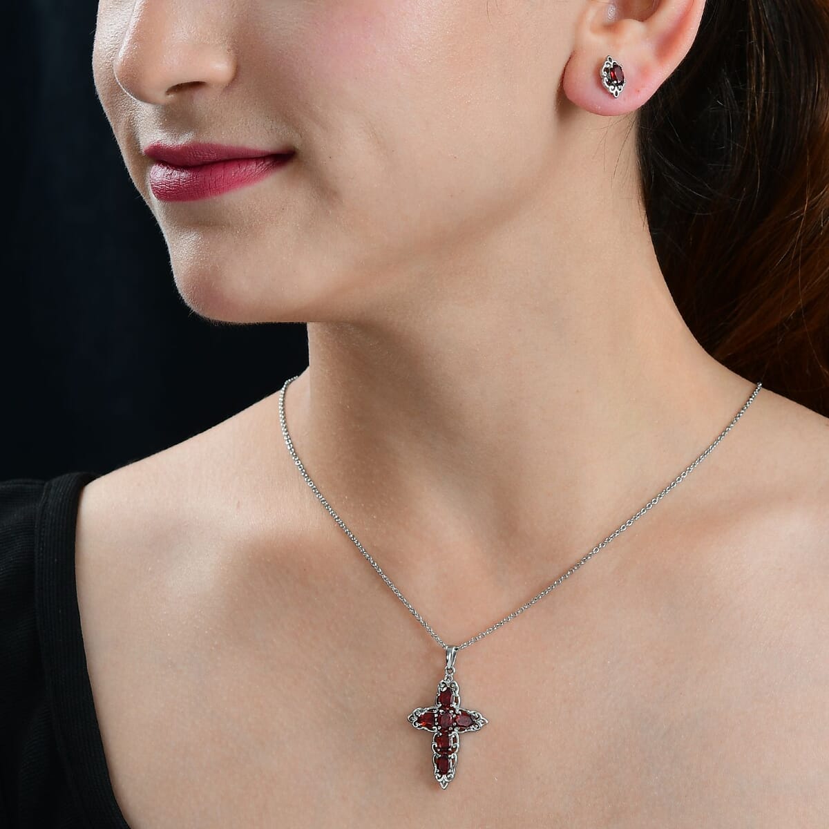 Mozambique Garnet 4.30 ctw Stud Earrings and Cross Pendant Necklace (20 Inches) in Stainless Steel image number 2