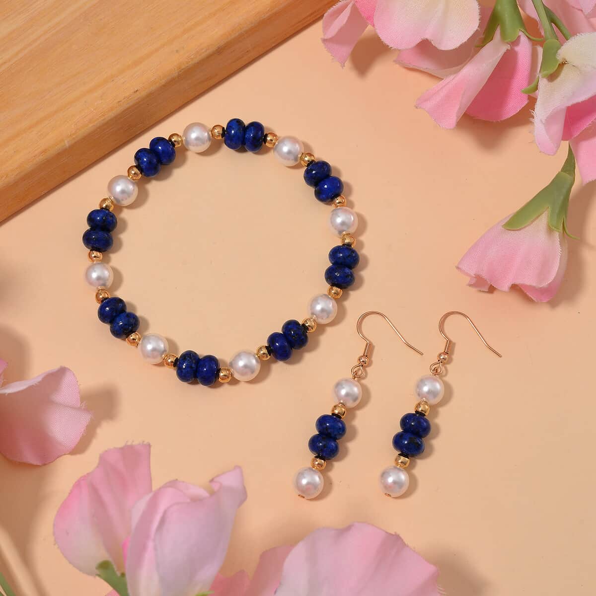 Lapis Lazuli 50.00 ctw and White Shell Pearl Bracelet (6.50-7.0In) and Earrings in Goldtone image number 1