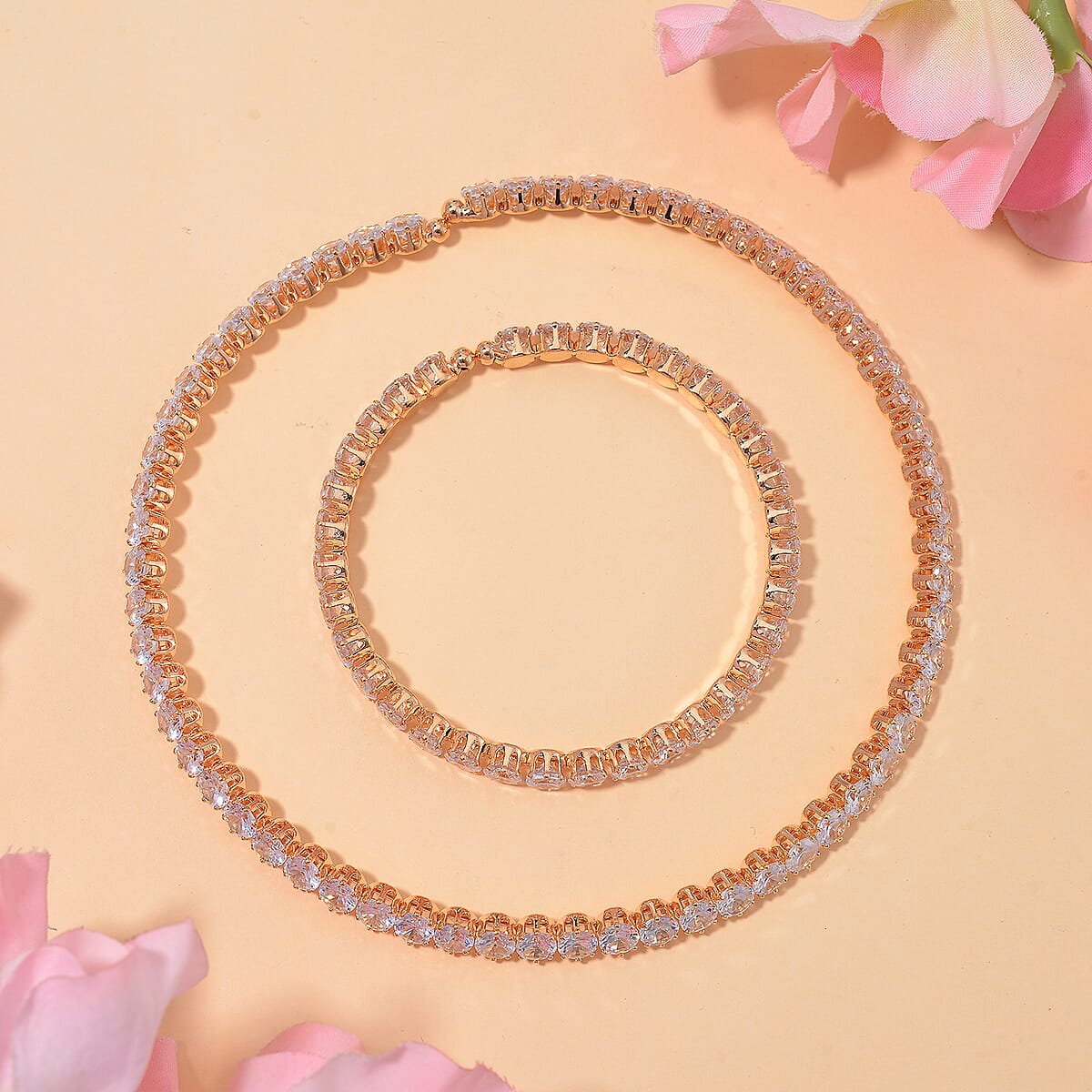 Simulated Diamond 130.00 ctw Necklace (16.50 Inches) and Stretch Bracelet in Goldtone image number 1
