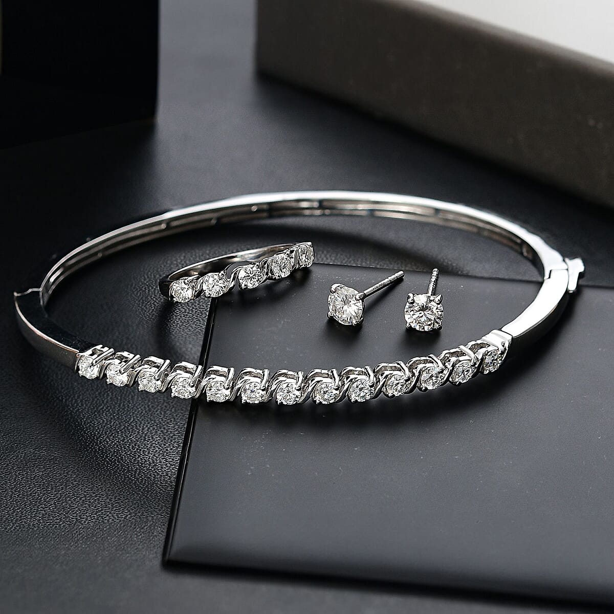 Set of 3 Moissanite 2.75 ctw Swirl Wave Bangle Bracelet (7.25In), Ring (Size 5.0) and Solitaire Stud Earrings in Rhodium Over Sterling Silver image number 1