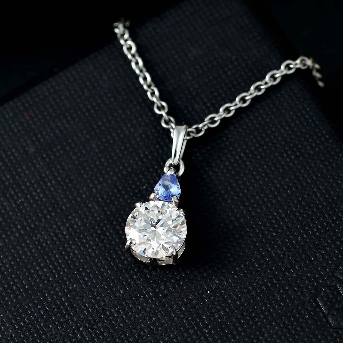 Moissanite and Tanzanite Pendant in Rhodium Over Sterling Silver with Stainless Steel Necklace (20 Inches) 1.50 ctw image number 1