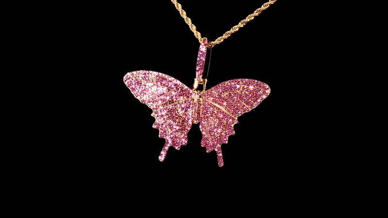 Pink Austrian Crystal Butterfly Pendant Necklace (24 Inches) in Goldtone