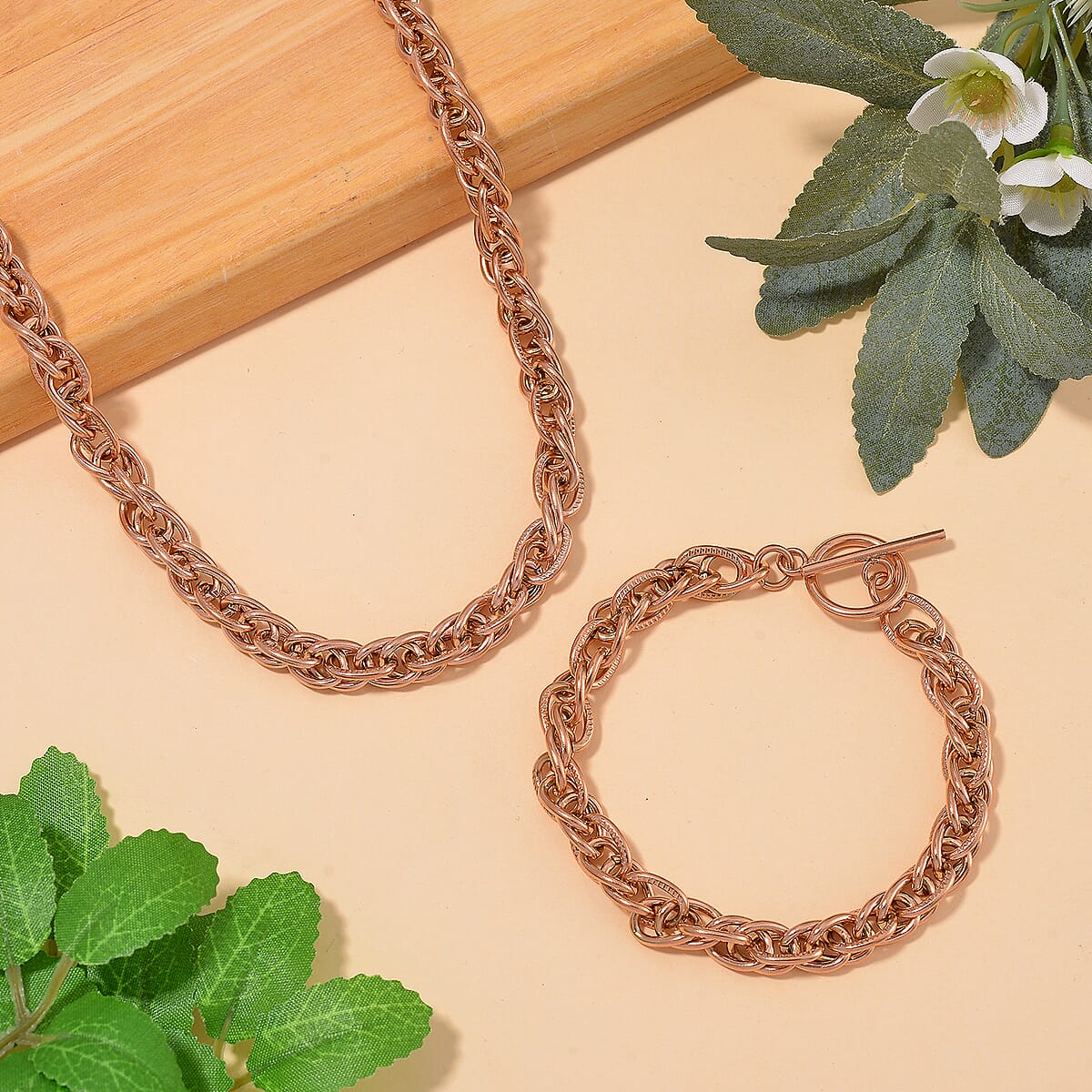 Set of Twisted Link Chain Necklace 20 Inches and Bracelet (8In) in ION Platede RG Stainless Steel image number 1