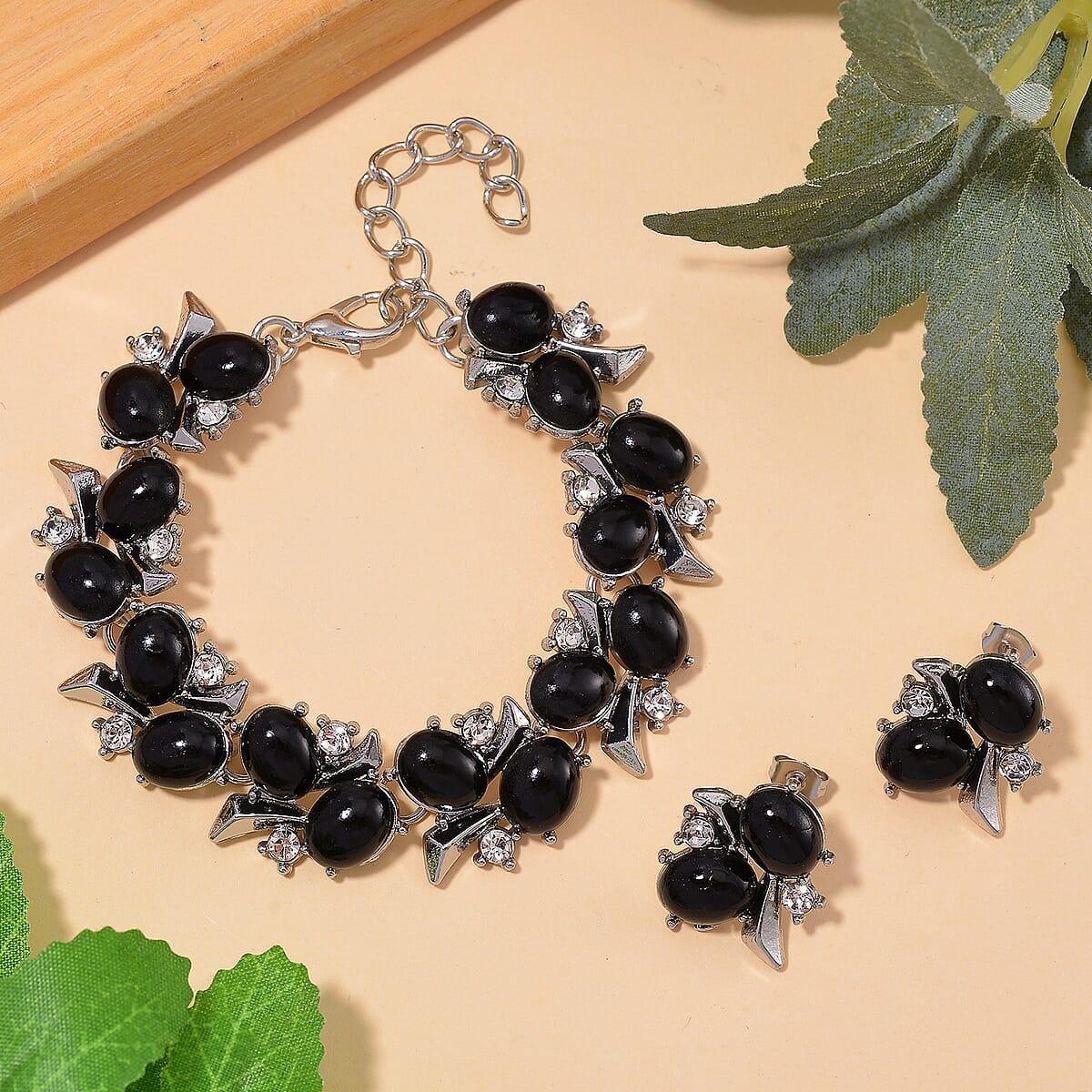 Constituted Black Howlite and White Crystal 90.00 ctw Bracelet (6.50-8.0In) and Earrings in Silvertone image number 1