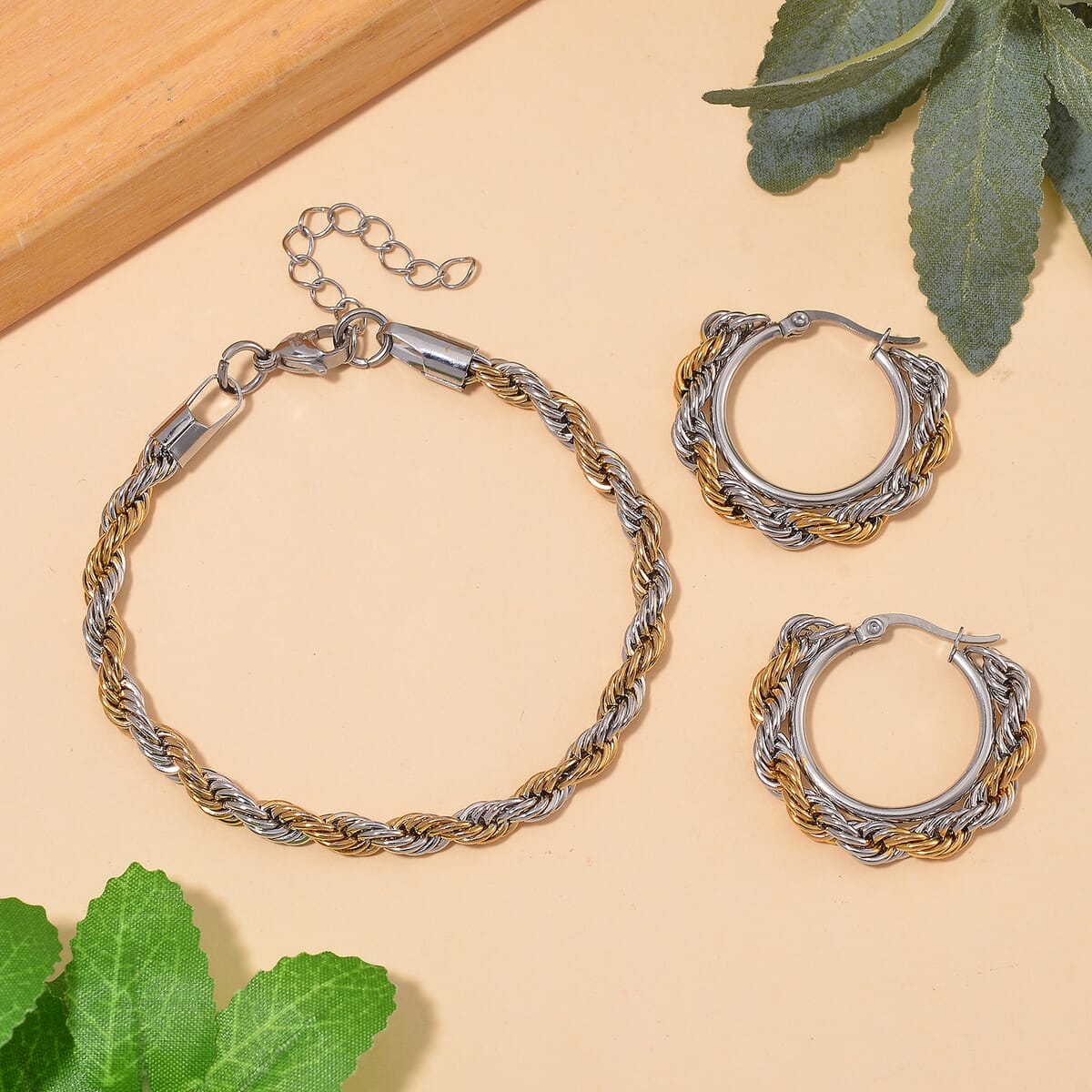 6mm Rope Chain Bracelet (7.50-9.50In) and Hoop Earrings in ION Plated YG and Stainless Steel image number 1