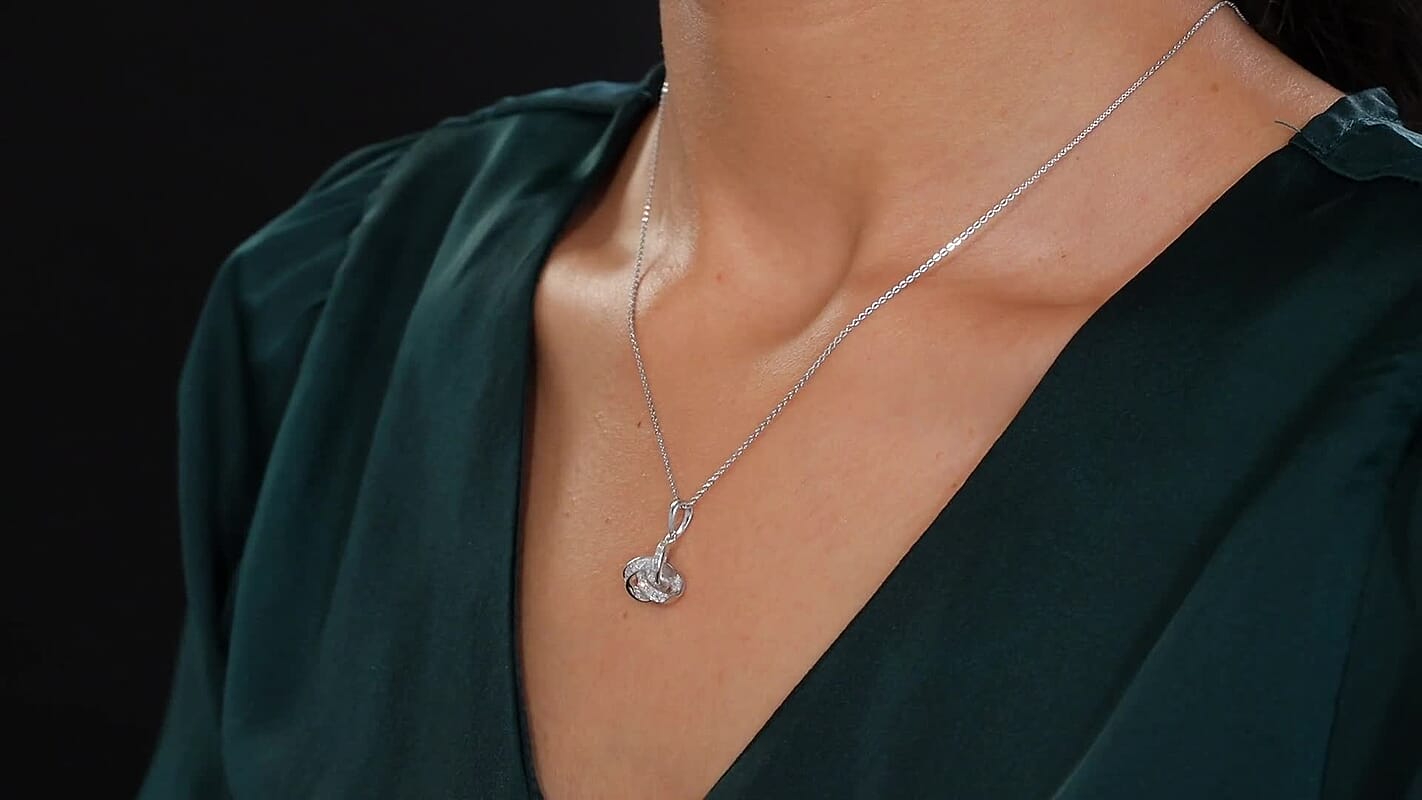 Luxuriant Lab Grown Diamond G-H SI 0.20 ctw Knot Pendant Necklace in Rhodium Over Sterling Silver 20 Inches (Del. In 10-12 Days)