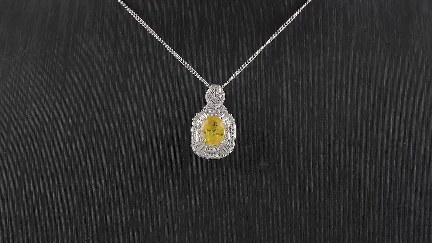D'Joy Tanzanite, White Zircon Pendant Necklace (18 Inches) in Rhodium Over Sterling Silver 2.00 ctw