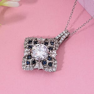 120 Faceted Moissanite and Madagascar Blue Sapphire 3.00 ctw Clover Leaf Pendant Necklace 20 Inches in Rhodium Over Sterling Silver 