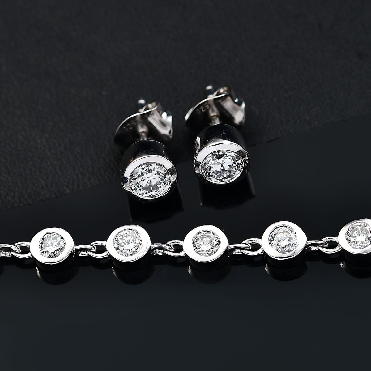 Luxuriant Lab Grown Diamond G-H SI 3.00 ctw Bracelet (8.0In) and Solitaire Stud Earrings in Rhodium Over Sterling Silver image number 1