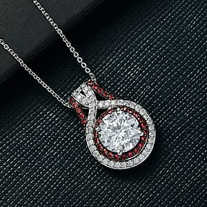 D'Joy Moissanite, Red Sapphire Halo Pendant Necklace in Rhodium Over Sterling Silver 3.35 ctw (20 Inches)